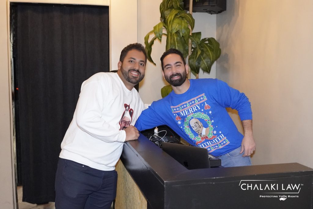Seam Chalaki posing with a DJ